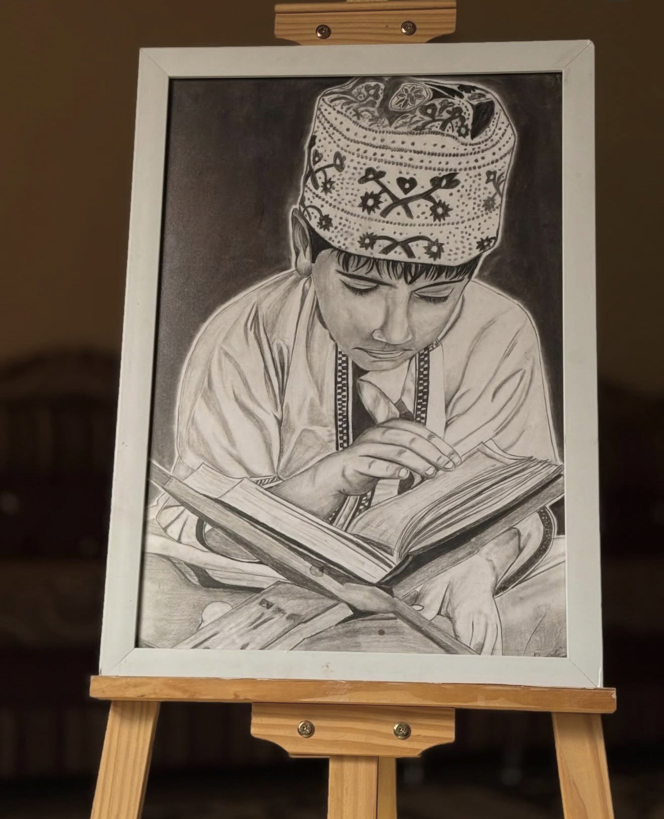 رسمة الفتى قارئ القرآن 